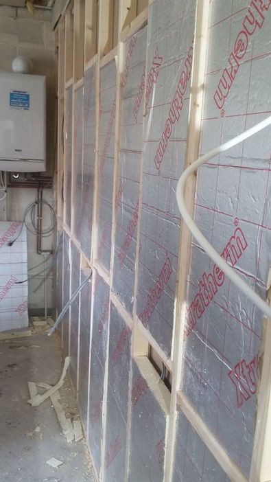 Stud walling and insulation in Harriseahead